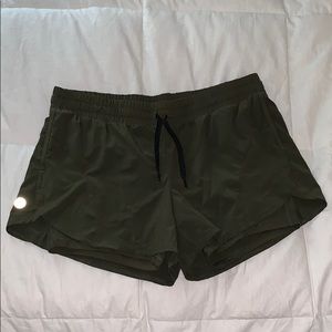 olive green shorts with tight liner